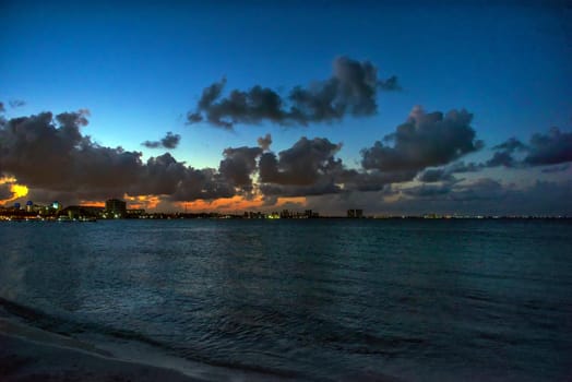 Sunset on the Caribbean Sea. Clear sky with small clouds. Clear weather.