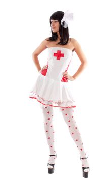 Beautiful sexy nurse striptease performer, isolated on white.