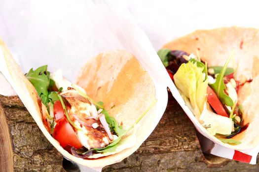mexican open tortilla wrap with chicken breast and vegetables