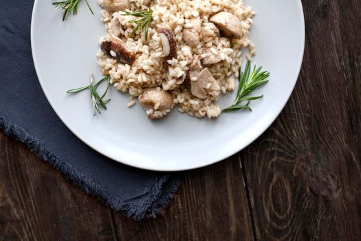 Risotto with mushrooms, fresh herbs and parmesan cheese.