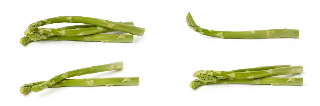 Fresh green asparagus on a white isolated background. Green asparagus isolate with shadow on white background