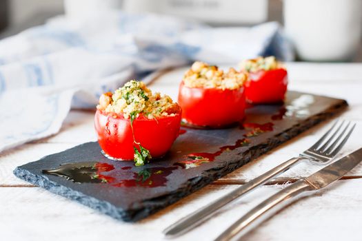 Tomato stuffed with cous cous. Vegetarian healthy food