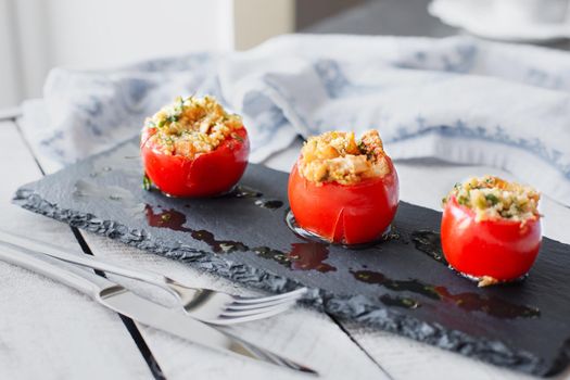 Tomato stuffed with cous cous. Vegetarian healthy food