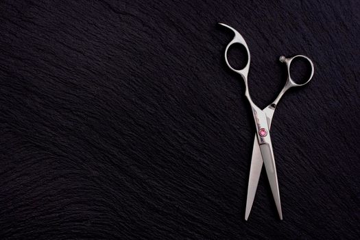 Hairdresser Accessories, Razor for cutting hair with copy space on black background