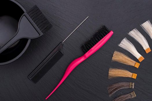 Hairdresser Accessories for coloring hair and Extensions colors on a black background