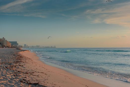 Dawn on the Caribbean Sea. Clear sky with small clouds. Clear weather.