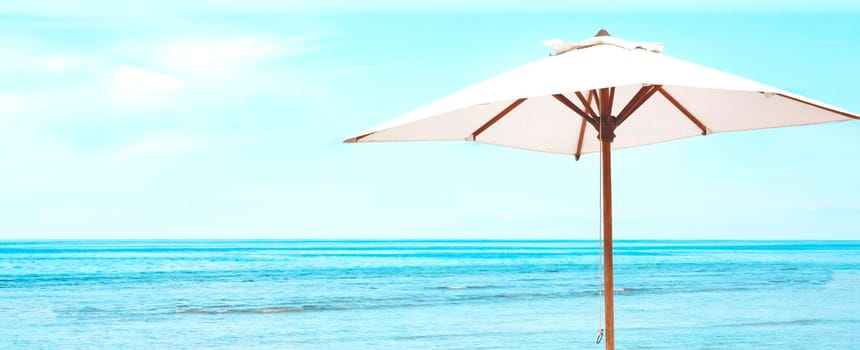 Beach Sun parasol on the blue sky