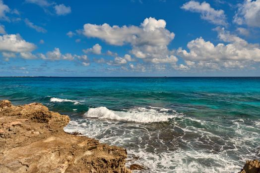 The coastline of white sand and rocks. Caribean sea.