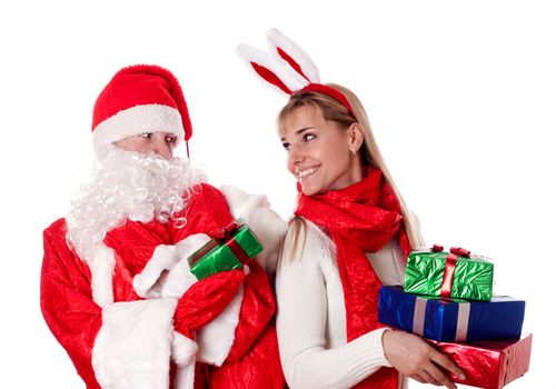 Christmas couple with gifts, isolated on white.