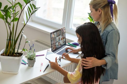 mother and daughter By laptop Online chat.