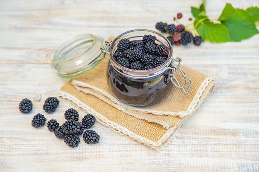 Blackberry jam in a jar. Selective focus. nature