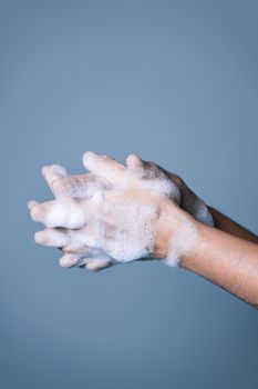 step by step procedure for correct hand washing for proper disinfection, step three, virus and bacteria prevention concept, vertical photo, copy space for text