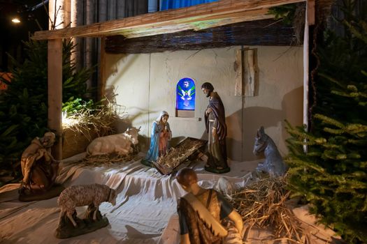 Christmas nativity scene without baby Jesus in the church