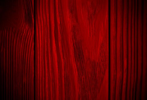 Red wood texture background. Abstract dark texture on red wall. Aged wood plank texture pattern in red tone. Rustic black floor old wood. Red rough texture background. surface blank.