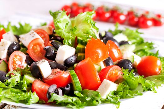 Greek salad in red boul close - up - Stock image