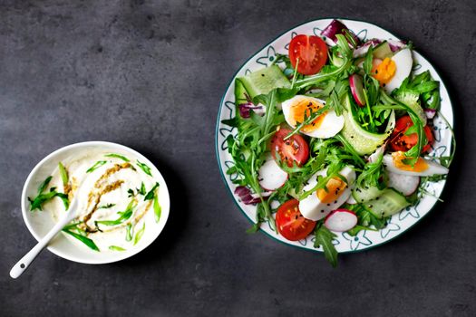 Greek salad on the gray copy space - Stock image