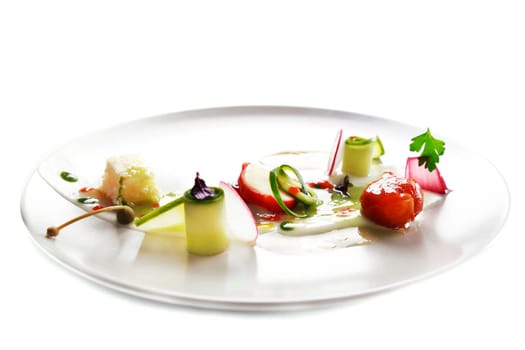 Molecular modern cuisine vegetable salad. Stock image. Isolated on white.