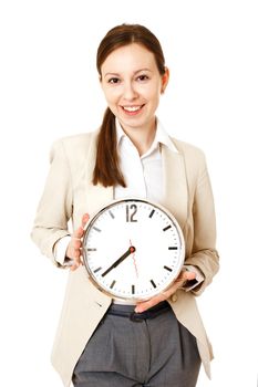 Smiley young businesswoman holding clock. isolated on white background