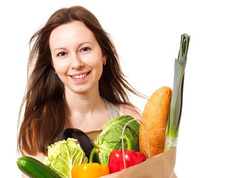 Happy Young Woman Holding Large Bag of Healthly Groceries - Stock Image/ Isolated on white