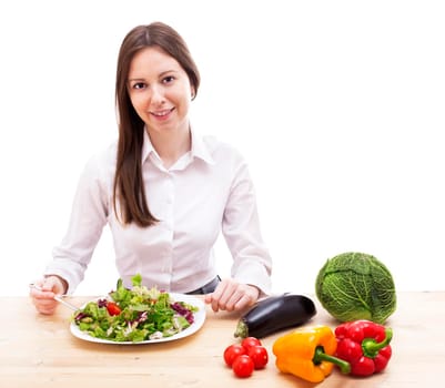 Woman with plate of salad and vegetables, isolated on white.