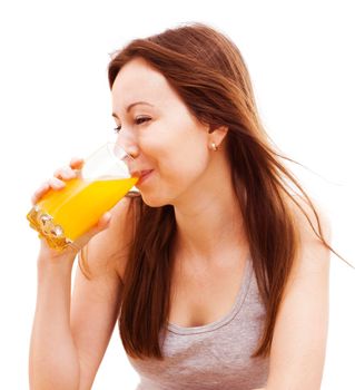 Smiling woman drinking orange juice, isolated on white