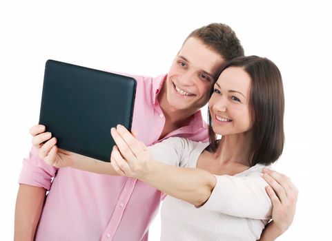 Attractive young couple taking a selfie together, isolated on white