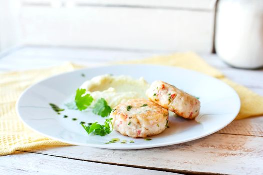 Fish or chicken cutlets with mashed potatoes. Restaurant.