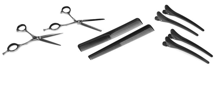 Hairdresser Accessories, Comb, Scissors and Razor for cutting hair on a white background