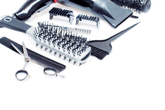 Hairdresser Accessories, Comb, Scissors and Razor for cutting hair on a white background