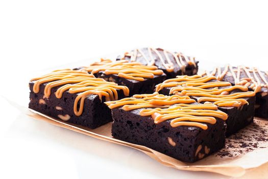 Dark Chocolate Cake with caramel. Pastry: Brownie - Stock image