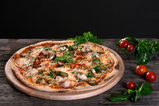 Pepperoni Pizza with bacon, meat , beef, cheese ,pickles , cucumbers and green onions on the wooden background. Top view. on the wooden background. Top view.