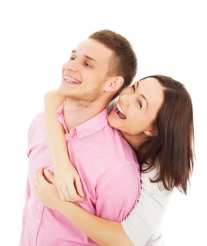 Portrait of a beautiful young happy smiling couple - isolated