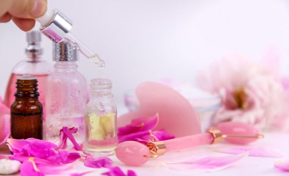 Pink flowers on white background spa facial. Selective focus. Nature.