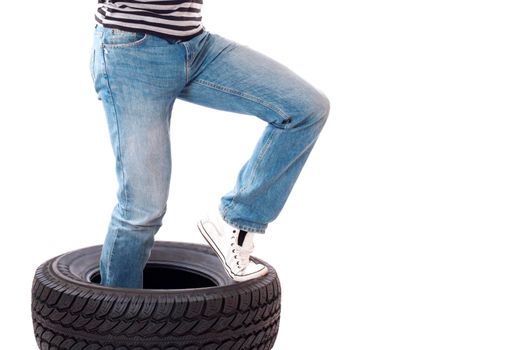 Man with car wheel or Tire. Isolated on white.