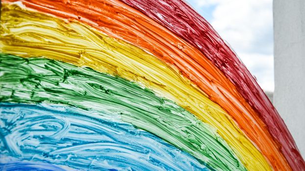 let's all be well. public flashmob children paint a rainbow on the windows waiting for the end of the quarantine pandemic coronavirus entertainment leisure home, copy space for text