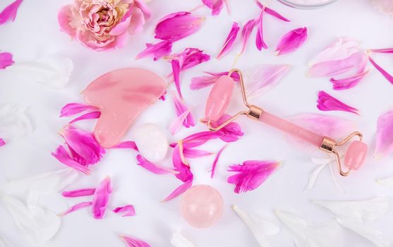 Pink flowers on white background spa facial. Selective focus. Nature.