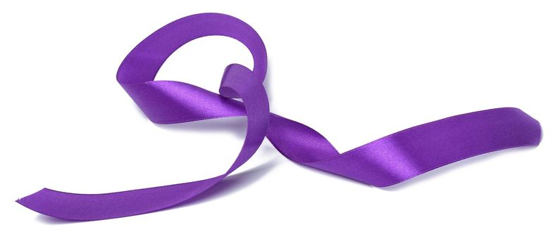 Rolled up silk purple ribbon isolated on white background