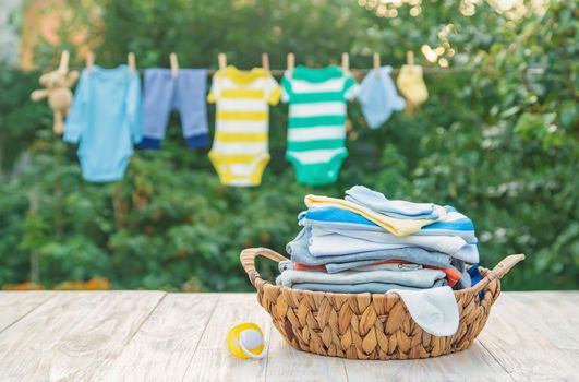washing baby clothes. Linen dries in the fresh air. Selective focus. nature.