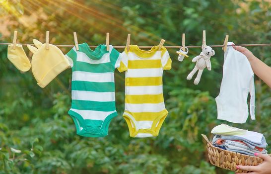 washing baby clothes. Linen dries in the fresh air. Selective focus. nature.