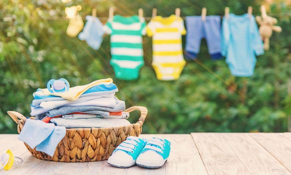 washing baby clothes. Linen dries in the fresh air. Selective focus. nature.