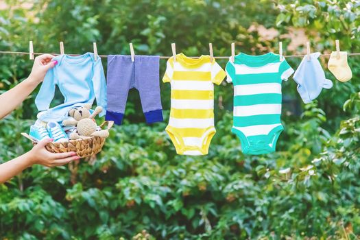 washing baby clothes. Linen dries in the fresh air. Selective focus. nature.