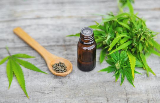 Cannabis oil in a small bottle. Selective focus. nature.