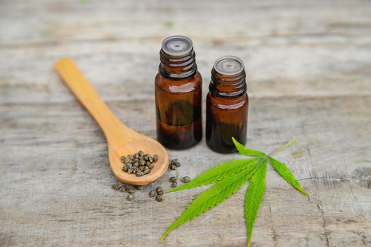 Cannabis oil in a small bottle. Selective focus. nature.
