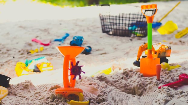 toys bucket for children play funny vacation at sea beach summer happy family relaxation.