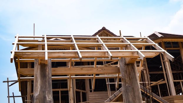 New residential construction home . the construction of a frame wooden house on a pile Foundation.