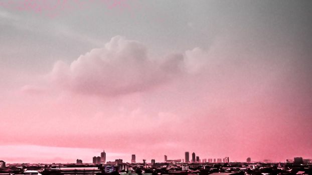 City building silhouette. Cityscape background against pink sky in evening of summer