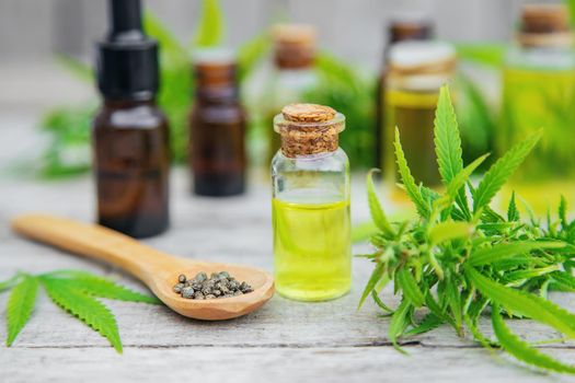 Cannabis oil in a small bottle. Selective focus. nature.