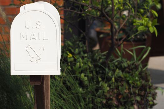 Old mail box. Vintage metal white post box . Old Mailbox made of metal with POST caption