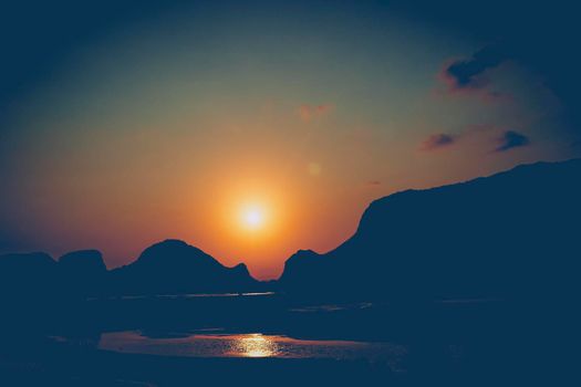 Beautiful landscape with mountain rocks. Sunrise in the mountains. Sun setting over hills