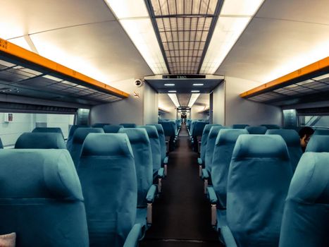 Blank space of chair back, inside high speed train compartment. An interior view of a modern intercity train in China